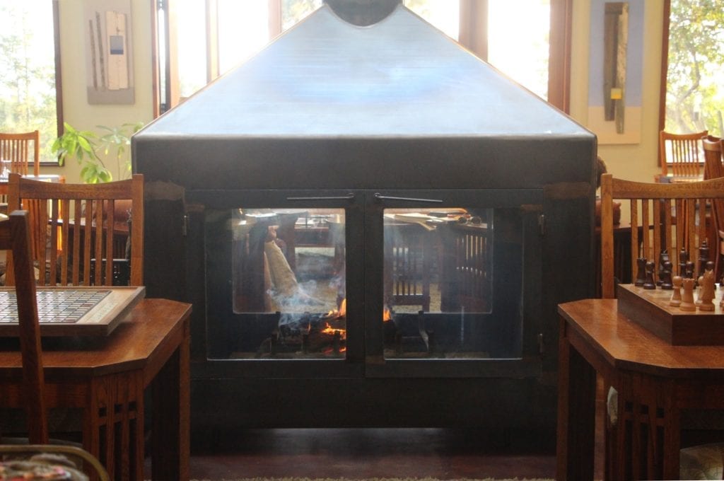 The glass and steel fireplace in the great room was custom-fabricated by a local shipbuilder.